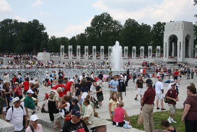 Before the rally program starts, attendees amble past and through the World War II Memorial at the East end of the reflecting pool.